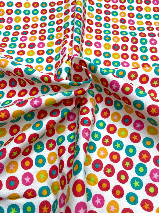 Colorful fabric with polka dot and star pattern