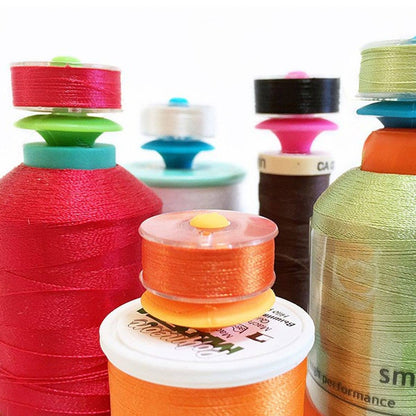 Bobbin holders for thread spools